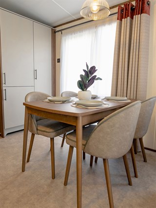 2027 Carnaby Carrington Static Caravan Holiday Home dining area
