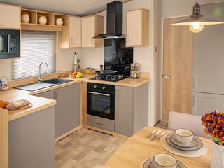 2027 Carnaby Oakdale Static Caravan Holiday Home dining area to kitchen