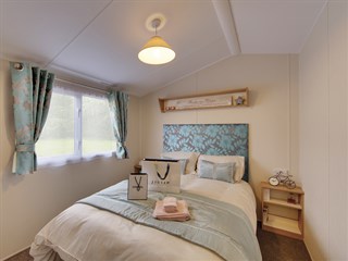 2023 Willerby Impression Static Caravan Holiday Home master bedroom.