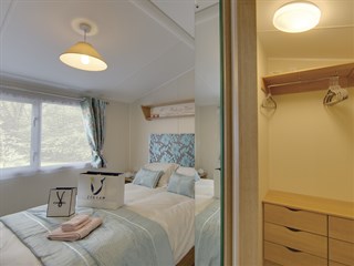 2023 Willerby Impression Static Caravan Holiday Home master bedroom walk in wardrobe.