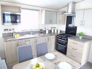 2023 ABI Saffron Static Caravan Holiday Home kitchen dining area