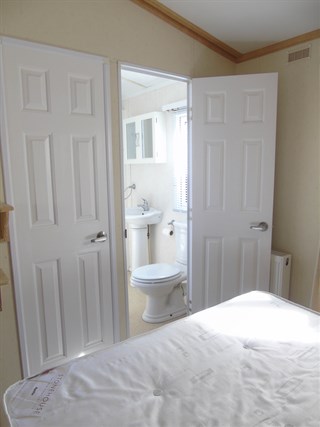 2005 Carnaby Roxburgh Static Caravan Holiday Home main bedroom jack and jill shower room