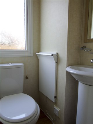 2009 Swift Burgundy Static Caravan Holiday Home toilet and sink