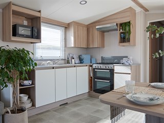 2026 Swift Royan Static Caravan Holiday Home dining area to kitchen