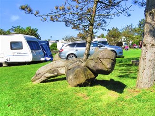 Wood carvings at Bagnol Caravan Park,  Treaddur Bay