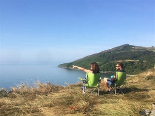 Treheli Farm Caravan Park couple relaxing