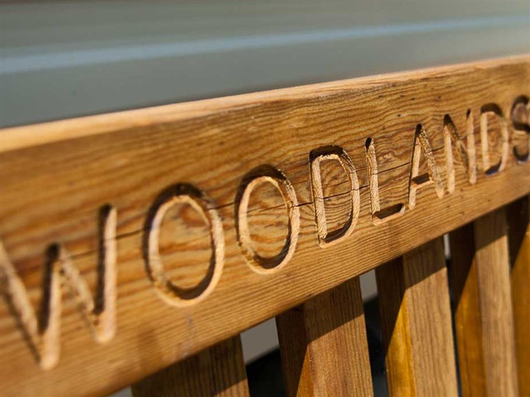 engraved bench at woodlands caravan park, pwllheli