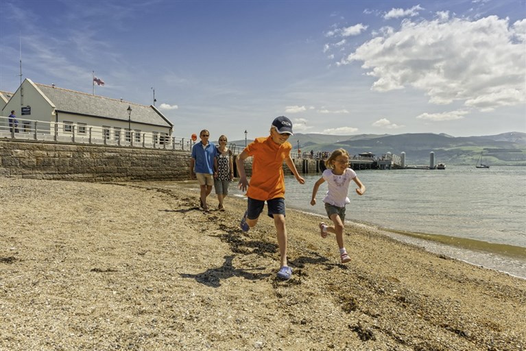 Family on Beaumaris beach