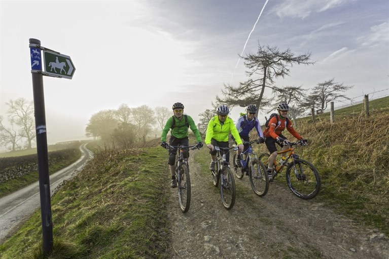 Mountain bikers on Loop de Loop route, Clwydian Range